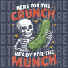 Skeleton holding a giant green pickle with text Here For The Crunch Ready For The Munch DTF transfer ready to press.