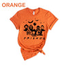 Orange-colored Funny Halloween T-Shirt. Features a 'Horror Movie Friends' print design that humorously brings together popular horror movie characters.